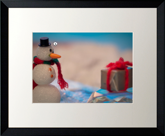 The snowman hopes his gift idea will be a hit.